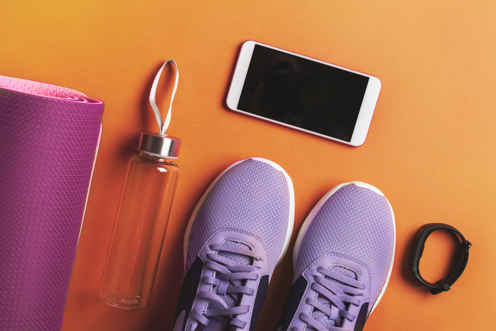  Sneakers, Water Bottle and Smartphone Flat Lay