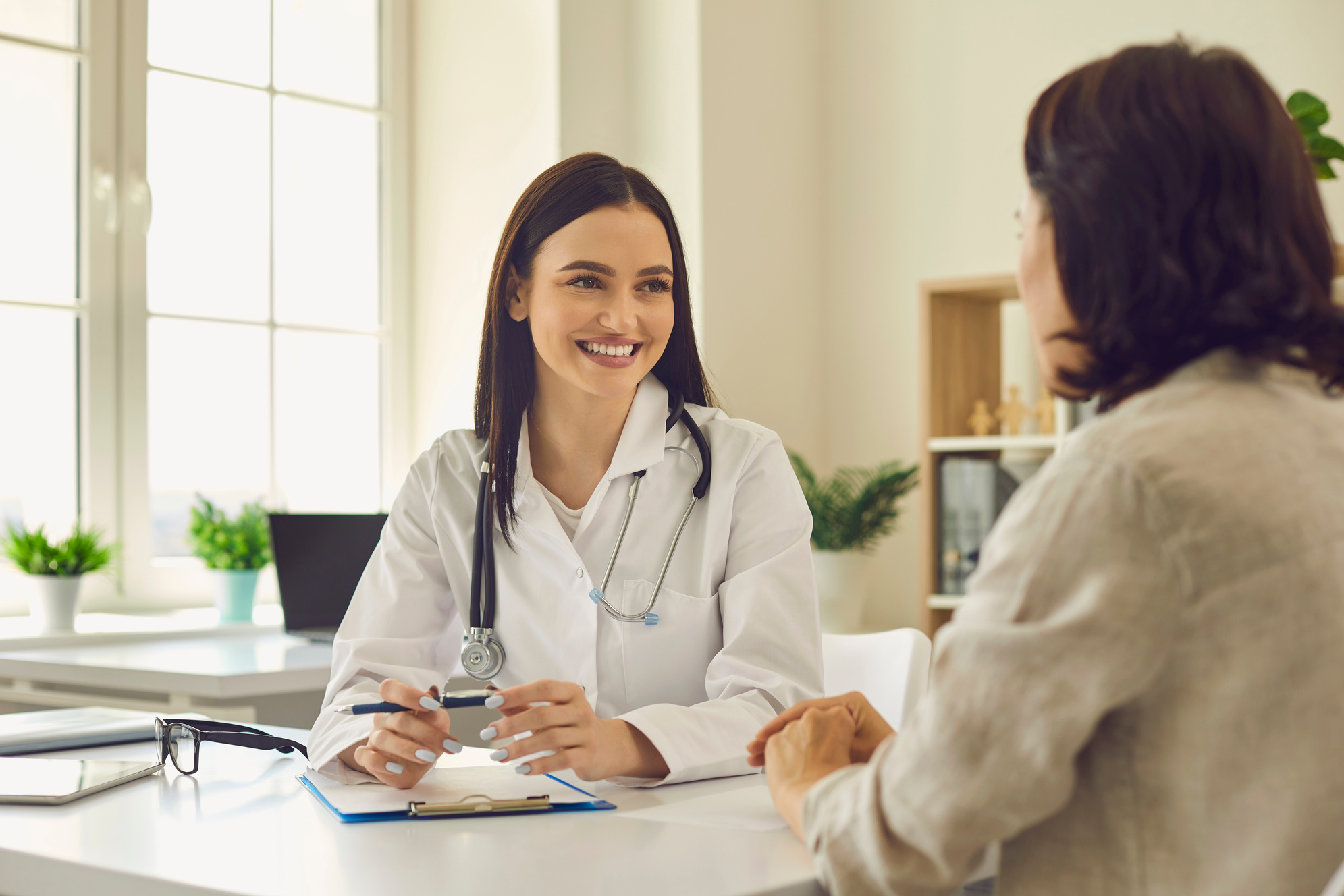 a doctor talking to a patient