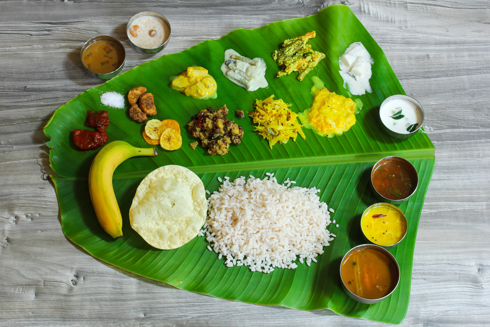 Traditionam Onam Sadya / Feast Served in Fresh Banana Leaf