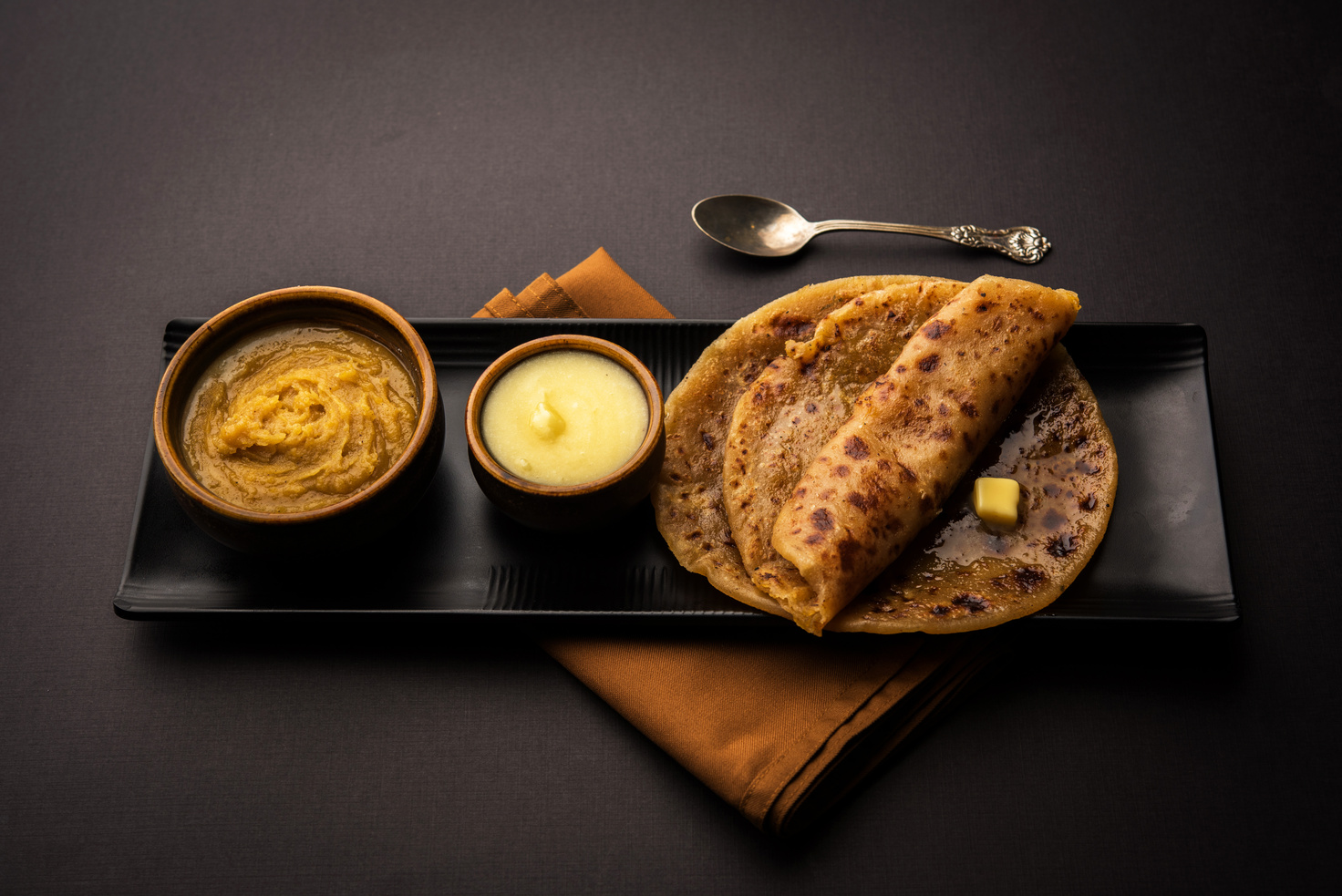 Puran Poli / Puranpoli / Holige / Obbattu - Indian sweet flatbread, selective focus